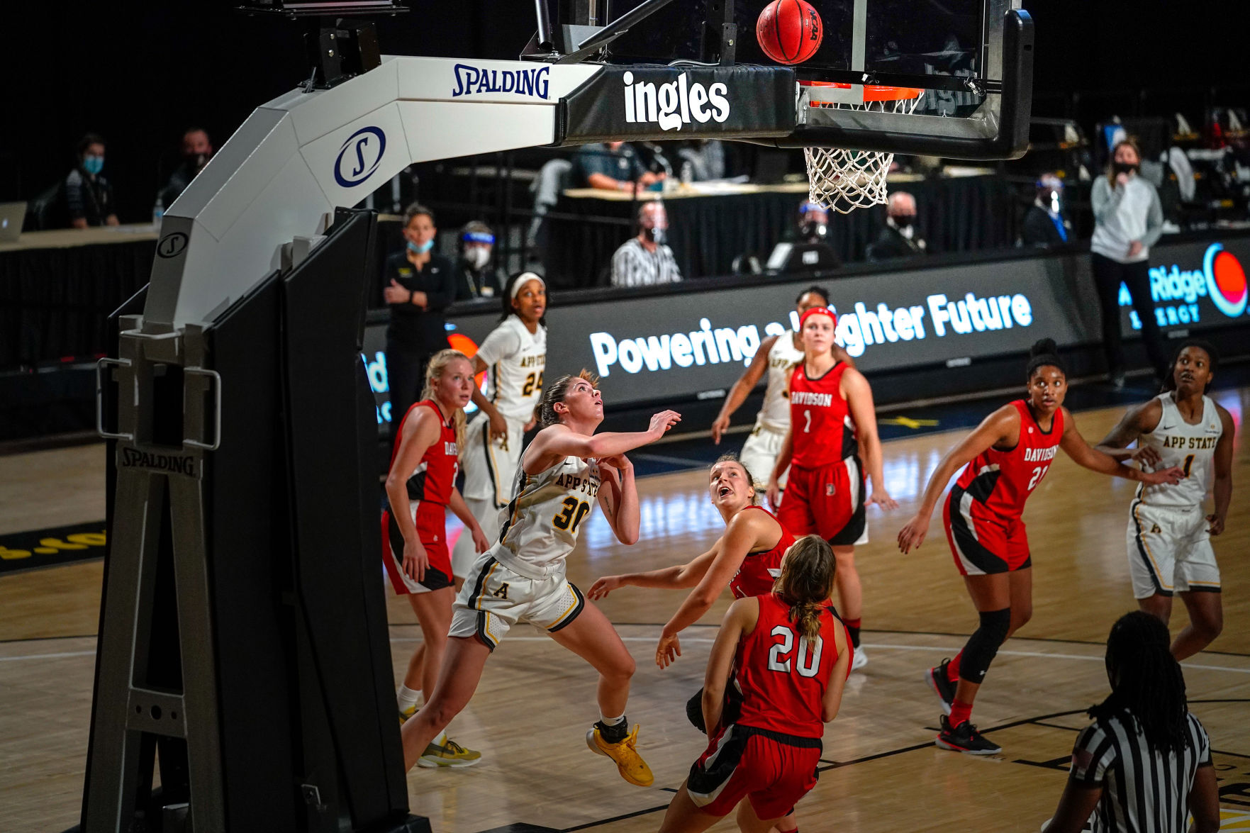 Lainey Gosnell follows shot to basket